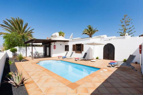 2 bedroom villa 'The Bungalow' with private heated pool.