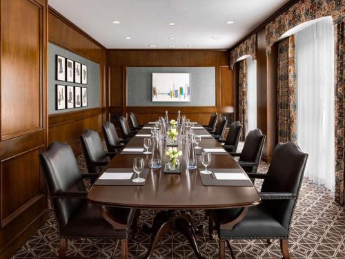 a conference room with a long table and chairs at Fairmont Olympic Hotel in Seattle