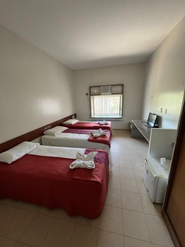 Postel nebo postele na pokoji v ubytování Delta Prime HOTEL