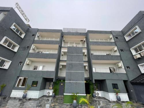 an apartment building with the front of it at Presken Residence in Ikeja