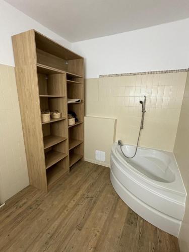 a bathroom with a white toilet in a room at Villa Fleur de Tiaré in Saint-Paul