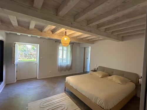 Katil atau katil-katil dalam bilik di Magnifique villa tout confort à 20m de Toulouse