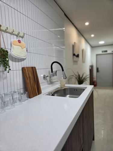 Una cocina o cocineta en 광안리 더 스테이