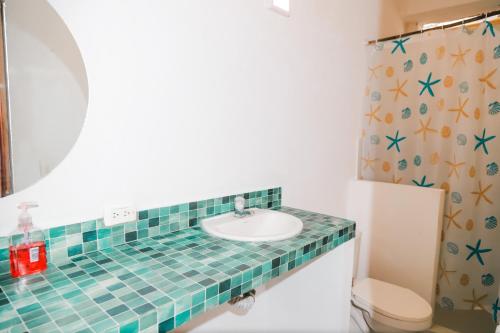 Koupelna v ubytování Hostal Casa en la Ciénaga Rincon del Mar