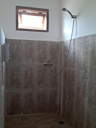 Ένα μπάνιο στο Tetebatu Flush Harmony