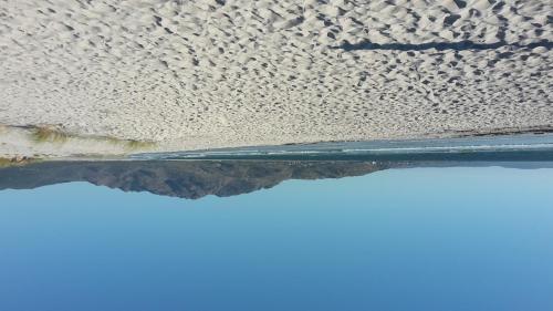 a close up of the front glass of a car at Apartamentos Playa Monte Pindo - Morada Druida in O Pindo