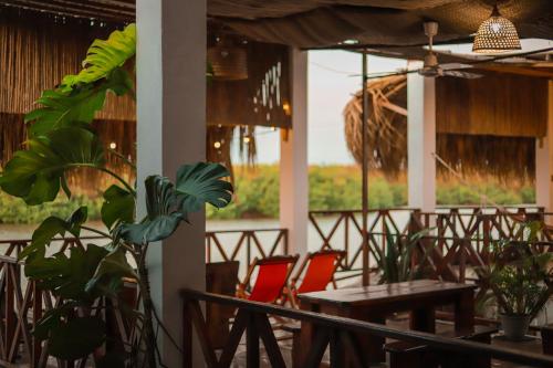 Restaurace v ubytování Hostal Casa en la Ciénaga Rincon del Mar