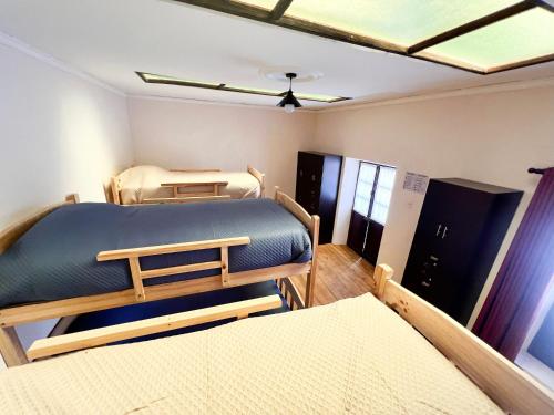 a bedroom with two bunk beds in a room at Casa Grau in Sucre