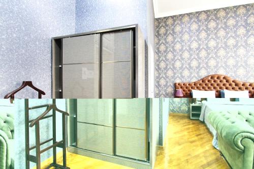 a room with a bed and a glass door at Pilot By Haz Hotel in Baku