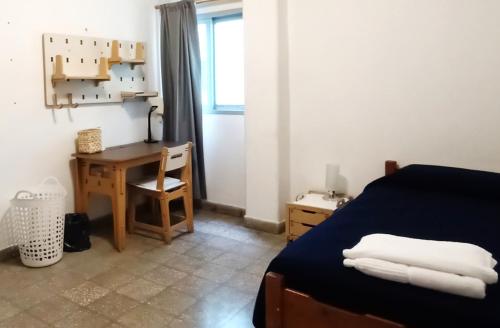 Ένα ή περισσότερα κρεβάτια σε δωμάτιο στο CLEI Residencia de Estudiantes, Buenos Aires