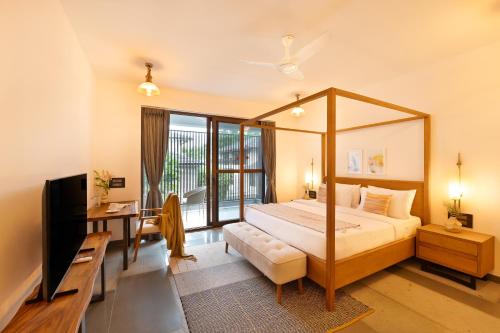 Ένα ή περισσότερα κρεβάτια σε δωμάτιο στο Melhor Stays Villa - L-S07 Luxury 4BHK villa with Private pool at Anjuna