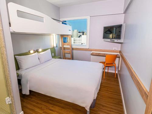 Кровать или кровати в номере Ibis Budget Fortaleza Praia de Iracema