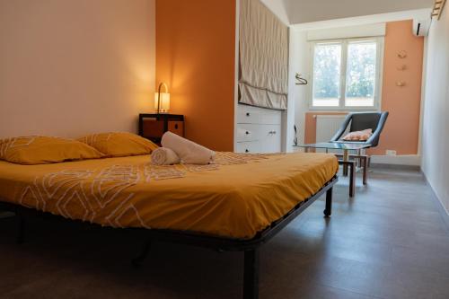 Ένα ή περισσότερα κρεβάτια σε δωμάτιο στο Le grand appartement, parking privé