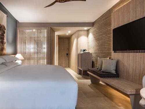 Кровать или кровати в номере Sofitel Barú Cartagena