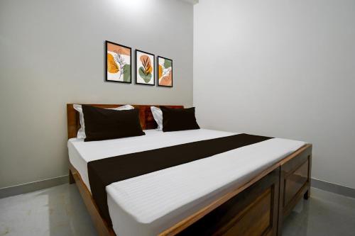Postel nebo postele na pokoji v ubytování Hotel O Ananta Grand