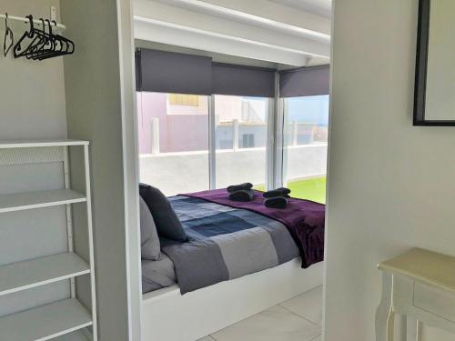 Giường trong phòng chung tại Ático Dio Vista tipo Dúplex con terraza soleada