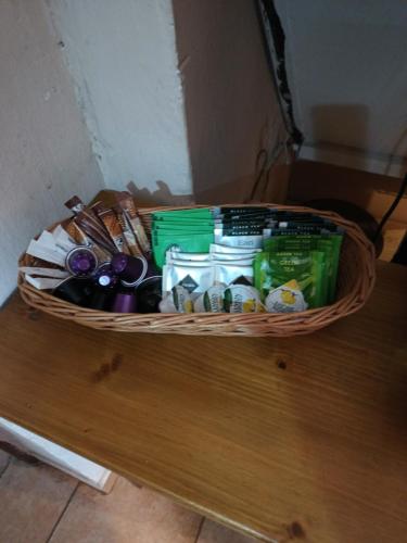 a basket filled with groceries sitting on top of a table at Chata Radim 