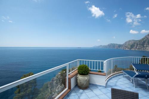 a balcony with a view of the ocean at Grand Hotel Tritone in Praiano