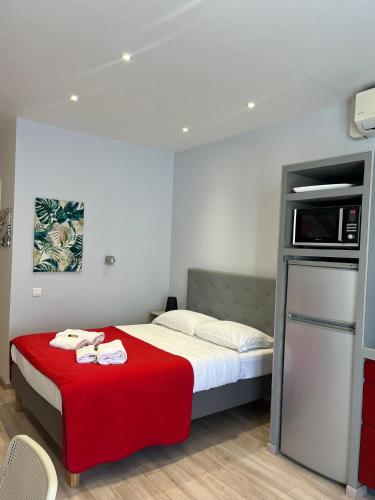 Llit o llits en una habitació de Red studio Buffa