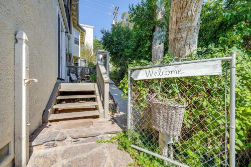 a gate with a welcome sign in front of a house at Chic Peaceful Retreat 16 Mi to Beaches and Wineries! in Santa Paula
