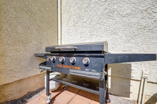 a grill sitting on a sidewalk next to a building at Chic Peaceful Retreat 16 Mi to Beaches and Wineries! in Santa Paula
