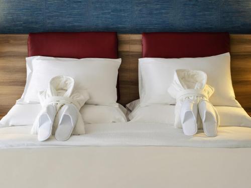 Cama o camas de una habitación en Mercure Geneva Airport