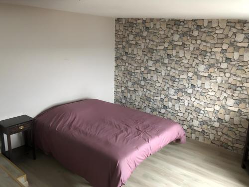 Cama o camas de una habitación en Logement Face Mer