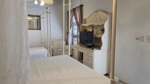 Postel nebo postele na pokoji v ubytování Hotel Casa la Tablada