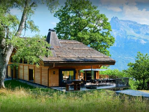 a house with a view of the mountains at Chalet RevAlp - OVO Network in Combloux