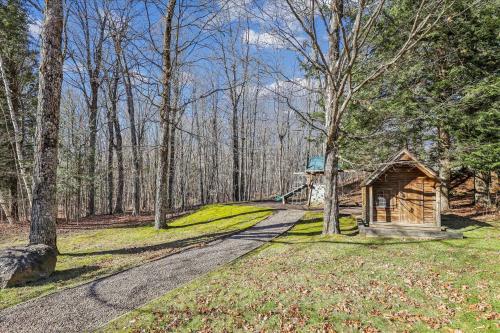 a small cabin in the middle of a road at Notchbrook 5 Apt. in Stowe