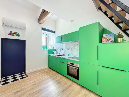 O bucătărie sau chicinetă la Toulouse-Capitole - Appartement à thème Mario