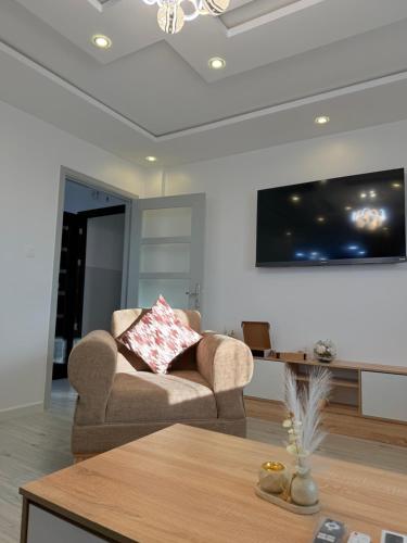 TV a/nebo společenská místnost v ubytování Kifan loft