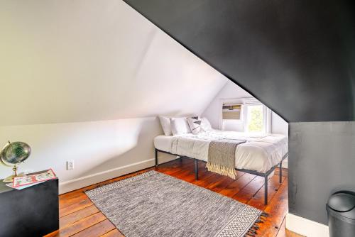 a bedroom with a bed in a attic at Short North Convention King Bed Free Parking! in Columbus
