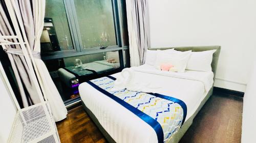 Cama o camas de una habitación en Velocity Residence linkway Sunway mall