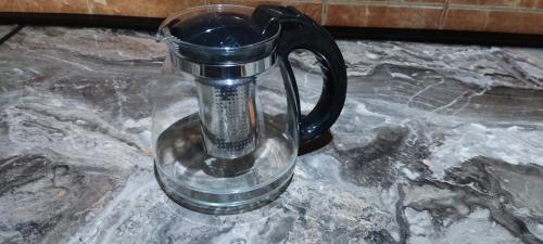 Příslušenství pro přípravu čaje a kávy v ubytování Apartman House Annesa