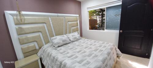 Hotel y Cabañas Parinzziにあるベッド