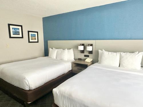 Кровать или кровати в номере Comfort Inn & Suites Cartersville - Emerson Lake Point