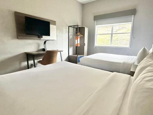 Кровать или кровати в номере Comfort Inn & Suites Cartersville - Emerson Lake Point