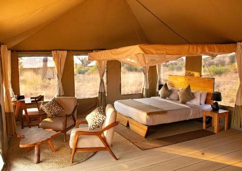 Postel nebo postele na pokoji v ubytování Tarangire Greenland Retreat