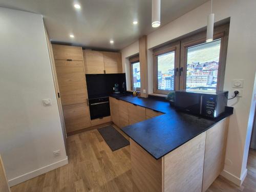 Appartement rénové avec balcon, au pied des pistes à Tignes
