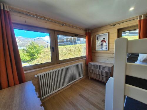 Appartement rénové avec balcon, au pied des pistes à Tignes