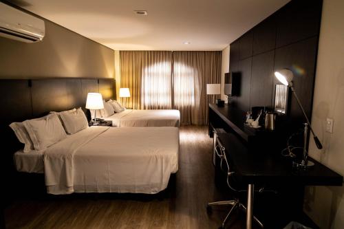 Katil atau katil-katil dalam bilik di Hotel Glory Near IGI Airport New Delhi
