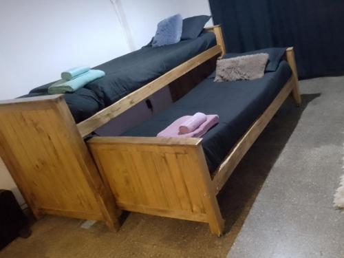 a pair of bunk beds sitting next to each other at PABLO`S departamento in Río Colorado