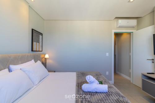 Postel nebo postele na pokoji v ubytování MHFs - Apts Variados em Prédio com Vista para o Mar em Itapema