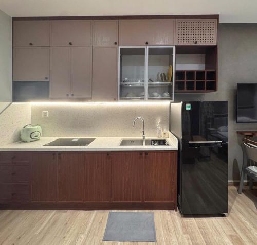 Η κουζίνα ή μικρή κουζίνα στο Aki Room Ở Space Ecopark