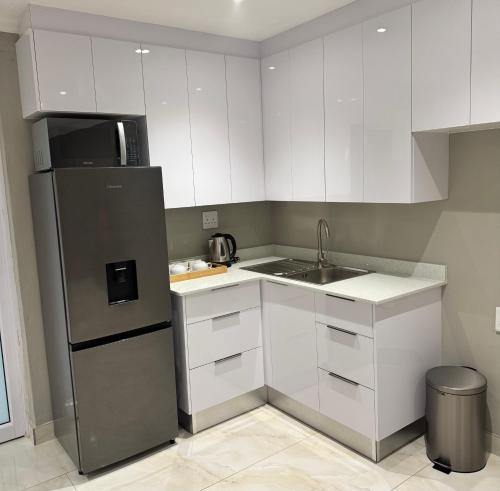 Η κουζίνα ή μικρή κουζίνα στο Luu Luxury Suite