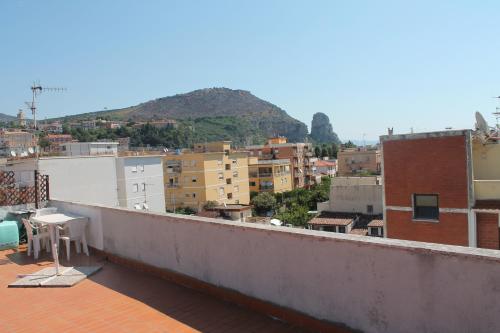 a view of a city from the roof of a building at Mansarda 25 in Terracina