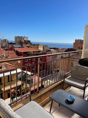 a balcony with a view of a city at Super Monaco 2 in Beausoleil