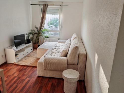 Ein Sitzbereich in der Unterkunft Charmant appartement au centre