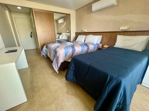 Voodi või voodid majutusasutuse Garvey 1014 Studio Catedral By Hospede Fácil toas